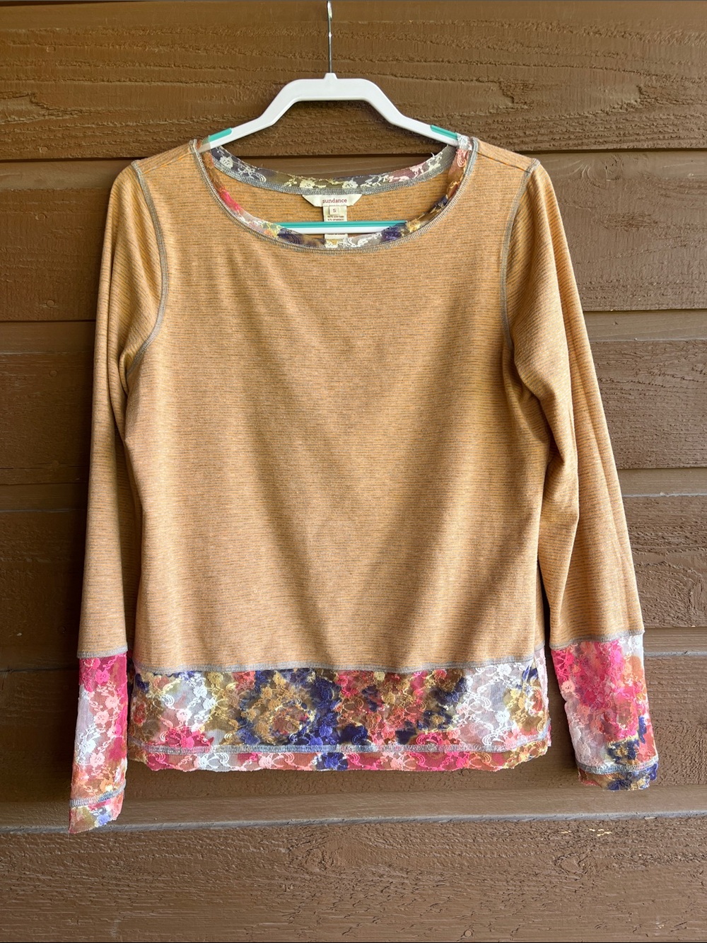 Sundance top with lace trim. Oversized small